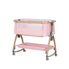 Chipolino Co-sleeping crib with drop side “Charisma" powder pink/wood + wheels KOSCA0265PP