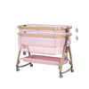 Chipolino Co-sleeping crib with drop side “Charisma" powder pink/wood + wheels KOSCA0265PP
